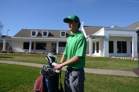 LOOKING FORWARD Cale chooses his club of choice after scoping out the yardage to the hole in one of the final tournaments of his high school career. “I am excited for the next level at college, but I will miss the team and the friendships and skills it has given me over the years,” said Cale Piedmonte Lang ‘22.