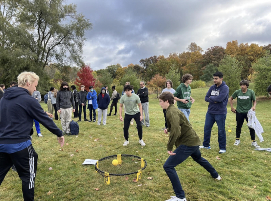 Spike-it! Will Rayner ‘23, Griffin White ‘23, and Jared Ge ‘23 compete in the Spikeball advisory challenge.
“It was a close game, but we [Husson’s advisory] were able to come out on top,” said White. “It was really cool when everyone gathered around our game since we were the last one, even Mr. Fayroian came out to be a watch and be a ref.”
