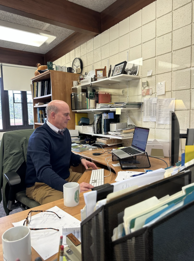 HARD AT WORK Director of Advancement Paul Gargaro is working late to work on kickstarting a fundraiser. “I am working on the GryFUN run, which is always one of my favorite events of the year,” said Gargaro.
