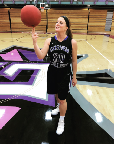 NOTHING BUT POTS Caitlyn O’Neal, now JV basketball coach and ceramics teacher, poses for her media day pictures at Goshen College. “Now, reflecting on basketball and what it taught me, I learned a lot about who I am, whats important to me, and who I am when things are difficult,” said O’Neal. “It offers an experience where you can learn a lot about yourself.”