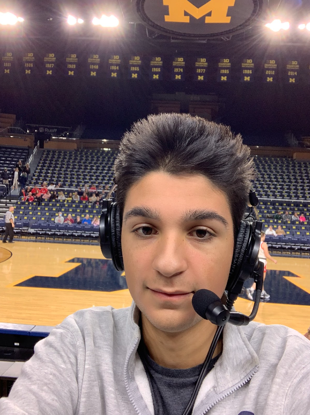 From the Big House to Breslin Center
Alumkal calls the Greenhills-Whitmore Lake Women’s basketball game in 2022 at the Crisler Center. Through the growth of Gryphon Sports Live, they have traveled around the state to call sports events. They were invited to commentate the high school state championships for football at Ford Field and basketball at Breslin Center. They have also called games at Michigan Stadium and Jackson Field.
