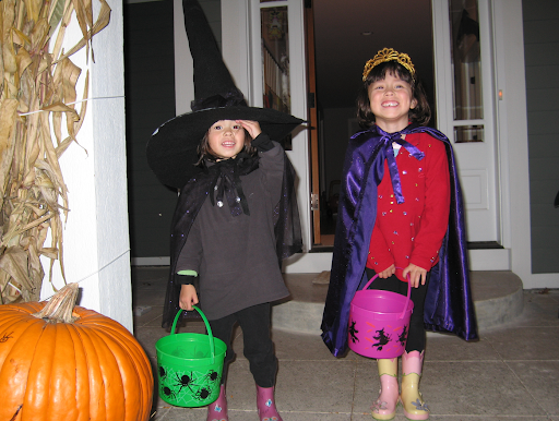 Knock! Knock! Ava Enlgesbe ‘24 prepares to trick-or-treat with her sister, Mia Englesbe ‘22, in Ann Arbor Hills during the early 2010s.
