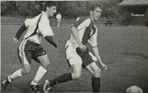 SOCCER STAR Dayne Bartscht ‘04, pictured on the right, was a star player and captain of the soccer team at Greenhills. “He was the guy you wanted on your team and the player that other teams loved to hate,” Associate Director of Admissions and former athletic director Eric Gajar said. “He was chippy, and he didn’t take anything from other people.”