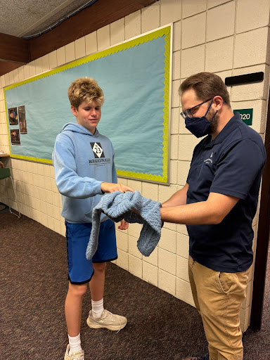 BABY BLUE Brian Magnus ‘27 gifts math teacher Josh Jetton a custom sweater for his baby. “Brian is incredibly talented and I’m so grateful that he was able to make my son an awesome sweater,” Jetton said.