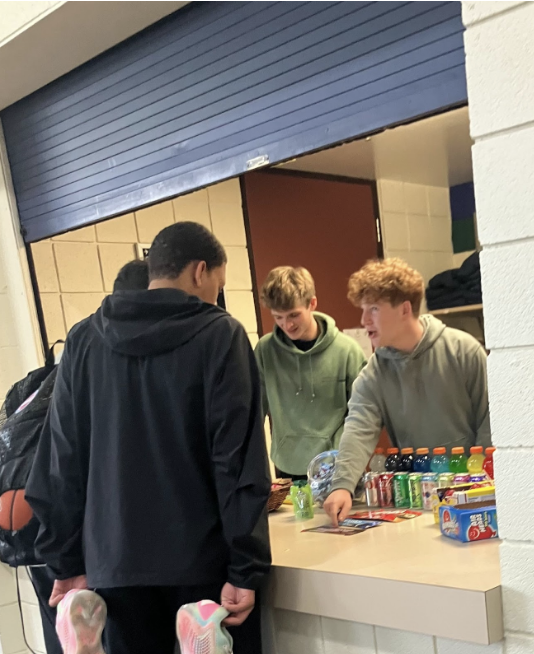 PRESSURE FOR CONCESSIONS
Two students, Liam MacDougald and Ben Bernstein work the concession stand during 3 home athletic events. Middle school Cross Country, Middle school volleyball, and Middle school Soccer. “It’s rewarding work because I meet younger people in the Greenhills community and have an input.” said MacDougald.